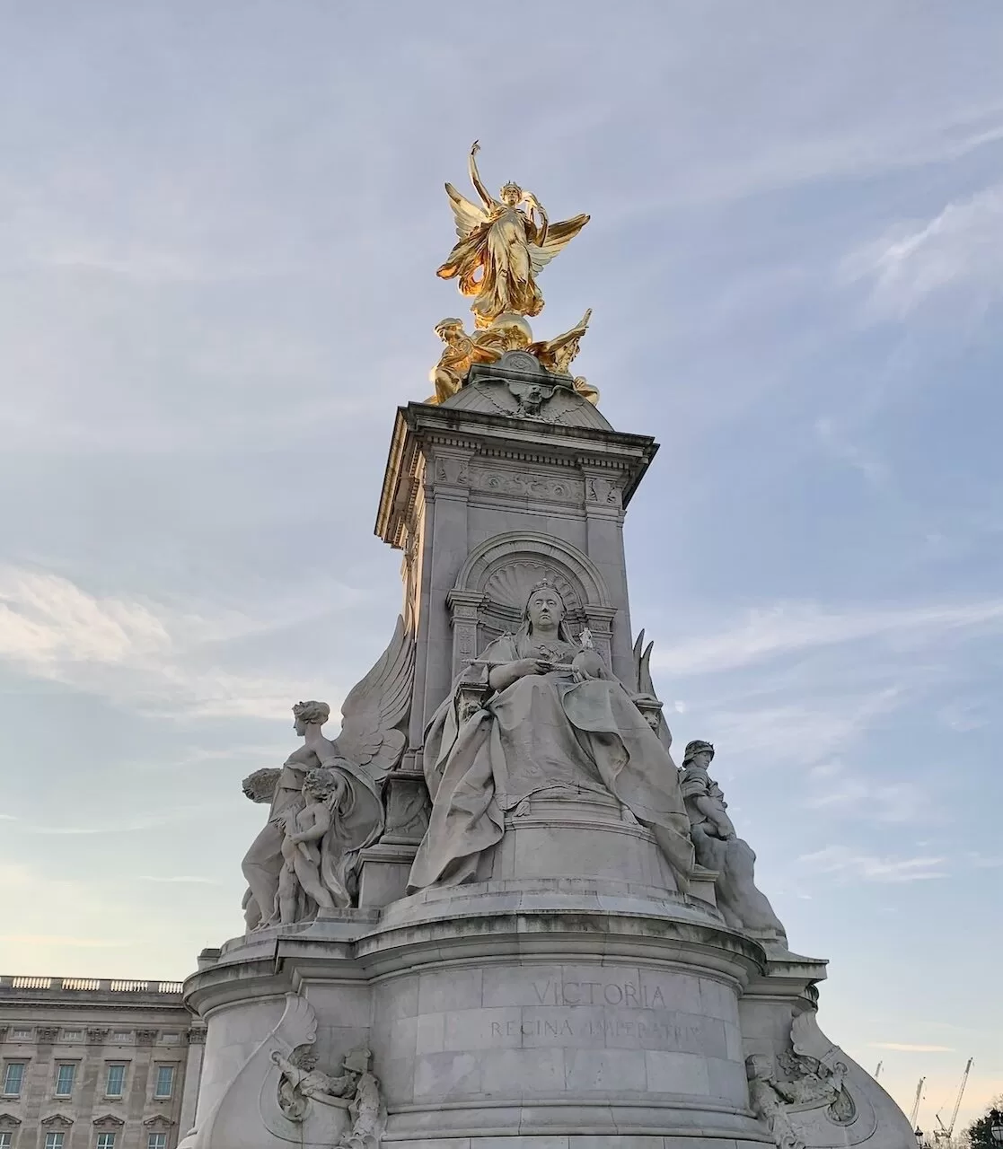 Buckingham Palace, Queen Victoria Memorial during golden hour in London